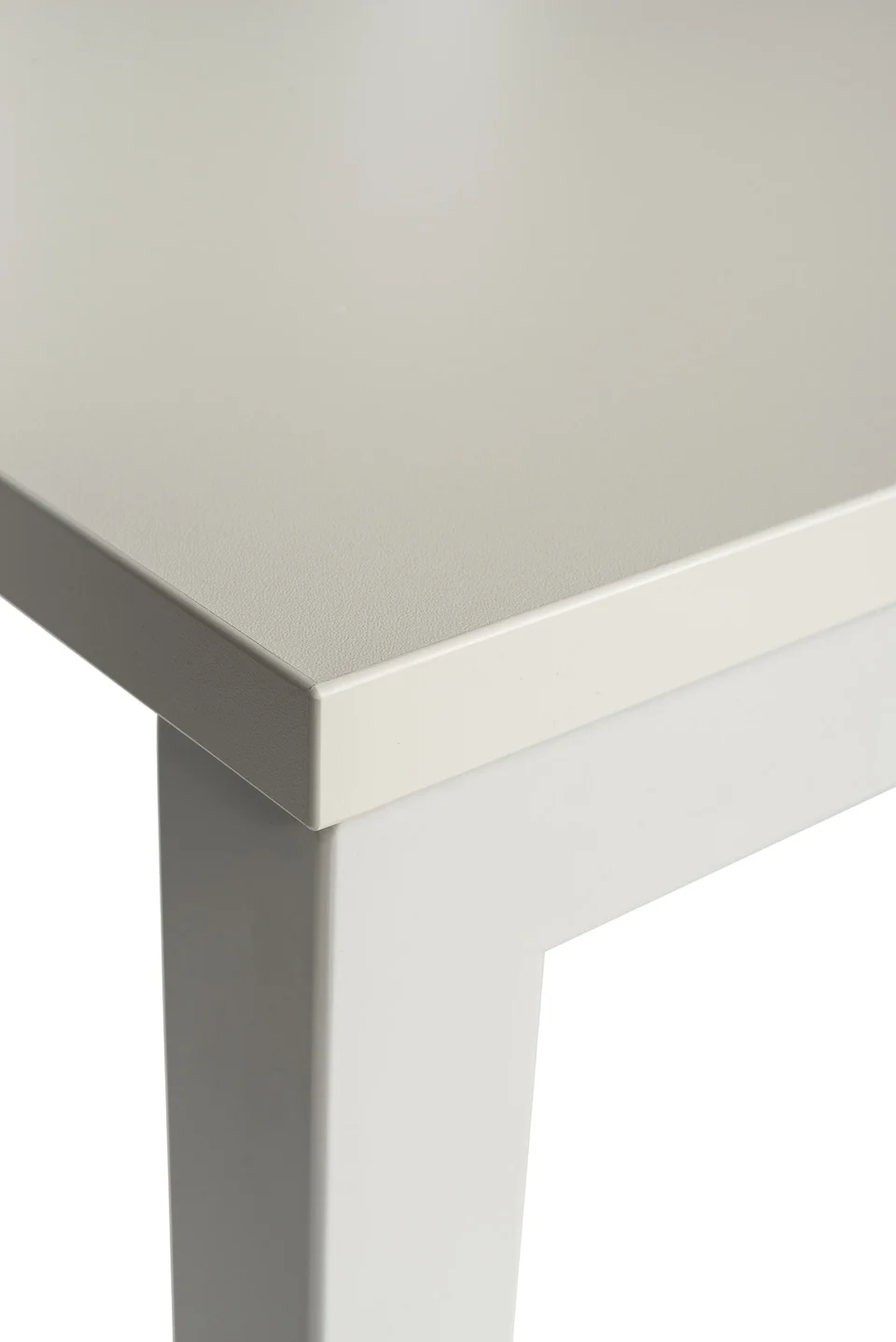 Corner of a Boring desk top and leg