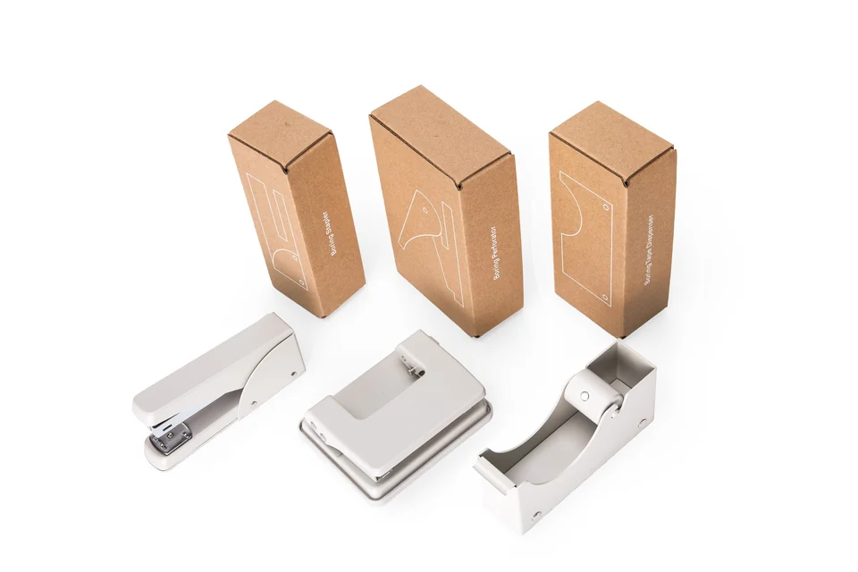 Boring stationery in unbleached cardboard boxes